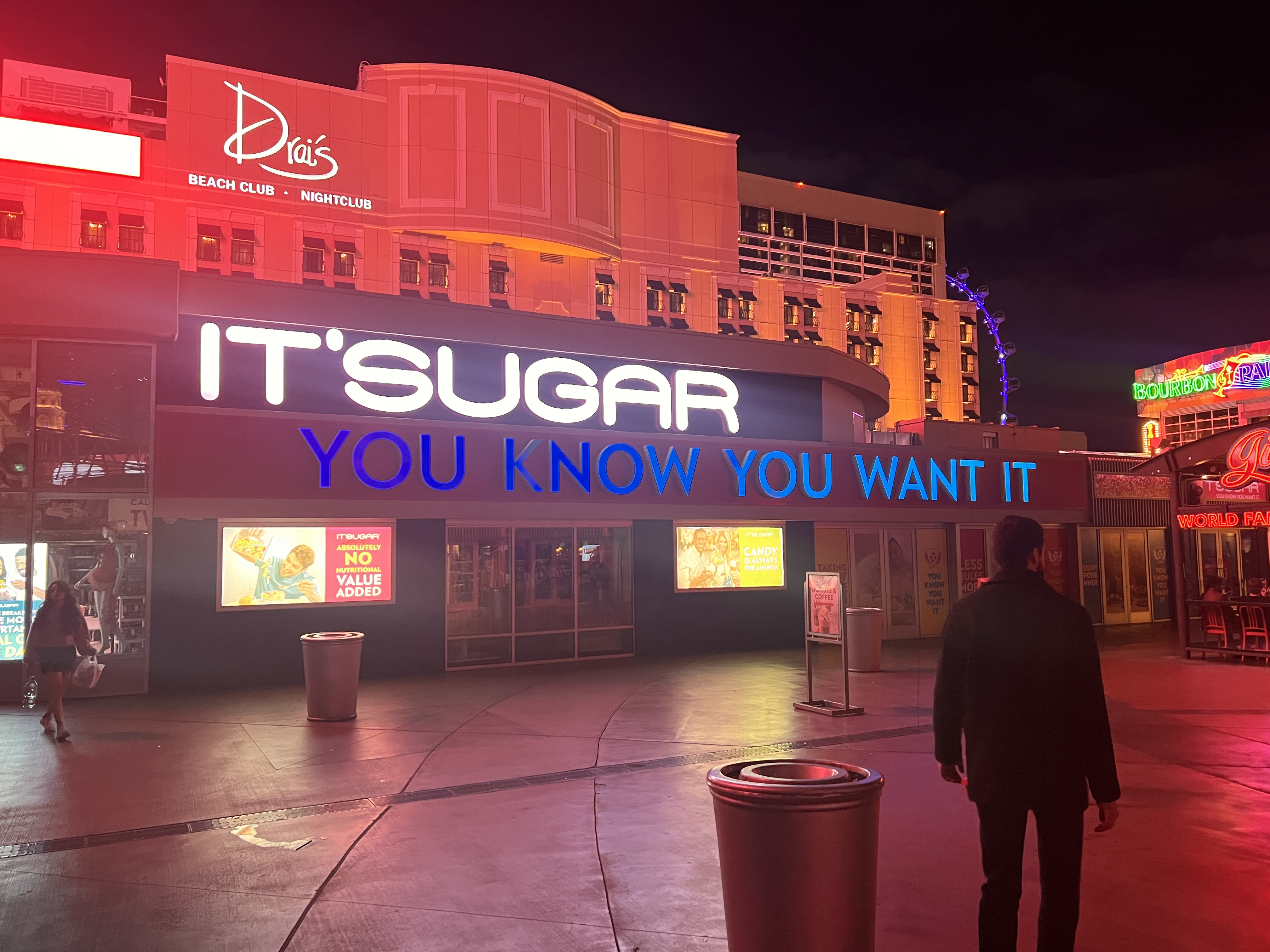 Exploring downtown Las Vegas, walking slightly ahead is a known friend.